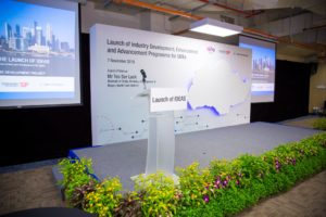 icube events_ideas launch 2016 stage backdrop with projector screens and landscaping