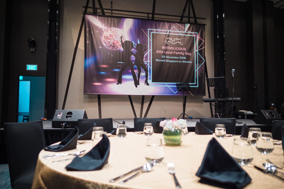 icube events_alfa laval family day 2018 stage backdrop with round table setting