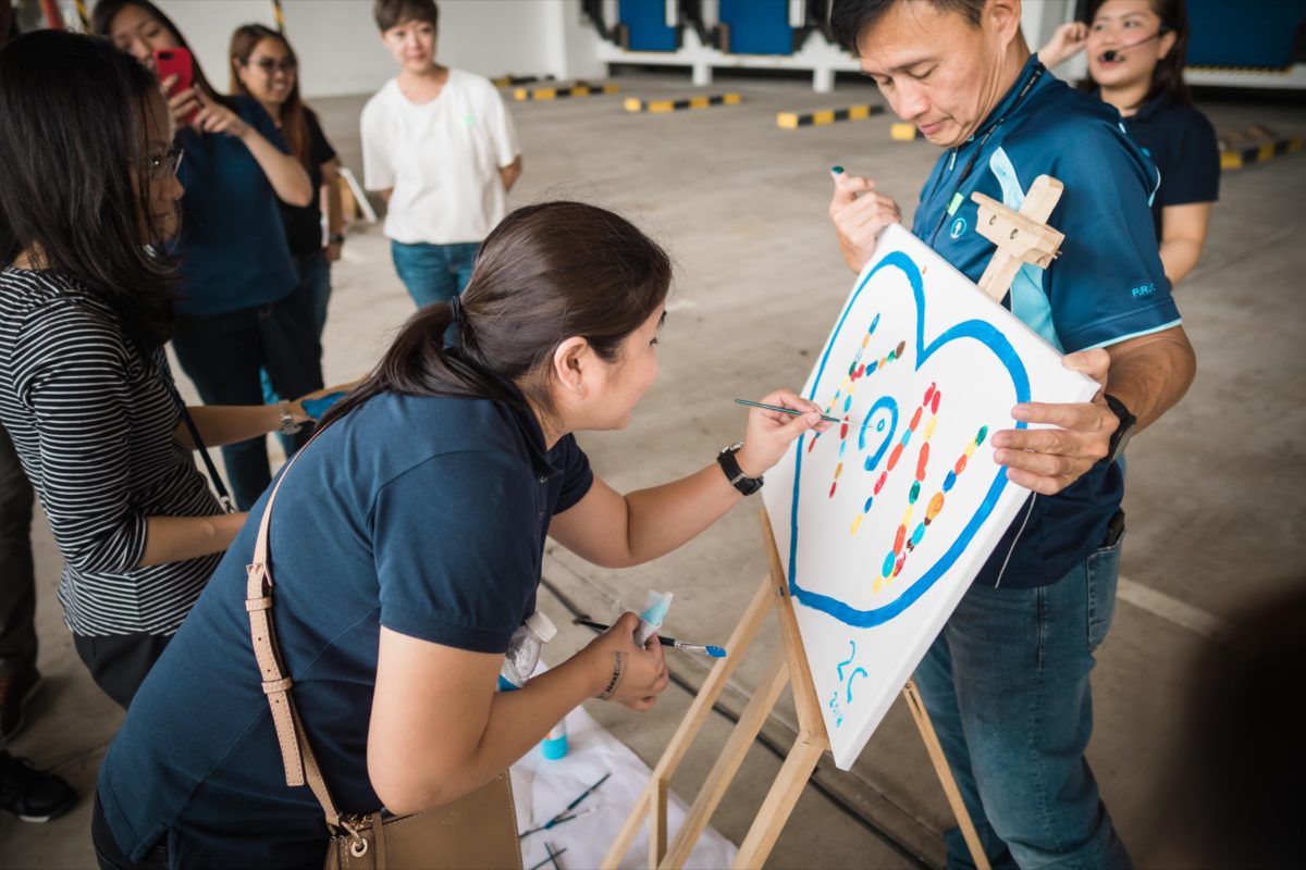 icube events_kuehne nagel next gen launch event teambuilding painting arts station